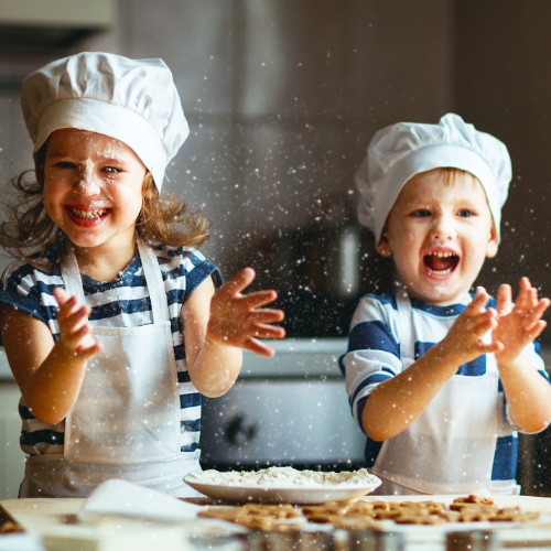 happy children cooking