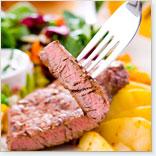 Biftecks aux poivres et brochettes d'artichauts