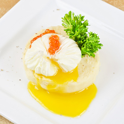 Caviar garnished poached eggs