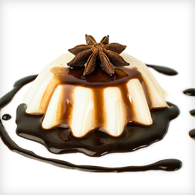 Cardamom Panna Cotta with Chocolate Syrup