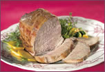 Grain-fed veal eye of round roast with coconut milk sauce and mango salsa
