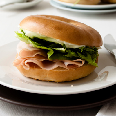 Bagel with Smoked Chicken Breast, Peppers and Pesto