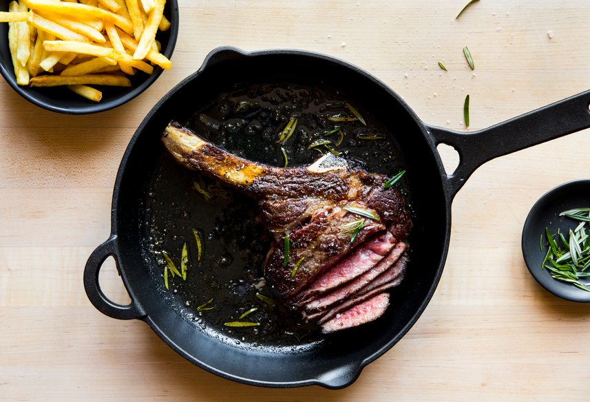 Rib Steak with Rosemary Butter Sauce