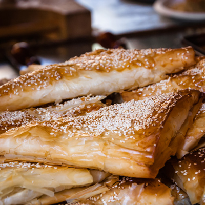 Feta Cheese, Pecorino and Local Spinach Burekas Topped With House Made Local Red Pepper Ketchup