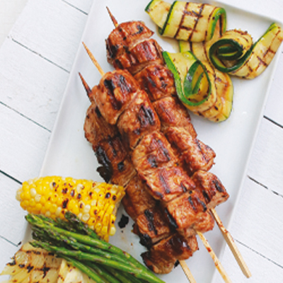 Grilled turkey skewers with maple syrup