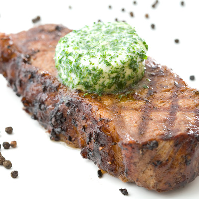 Grilled Strip Loin Steak with Basil Butter