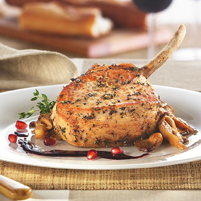 Skillet-browned Pork Chops with Oyster Mushroom Ragout and Pomegranate Syrup