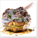 Veal Chops Stuffed with Cheddar, Fresh Thyme, Bay Leaf and Coarsely Ground Black Pepper