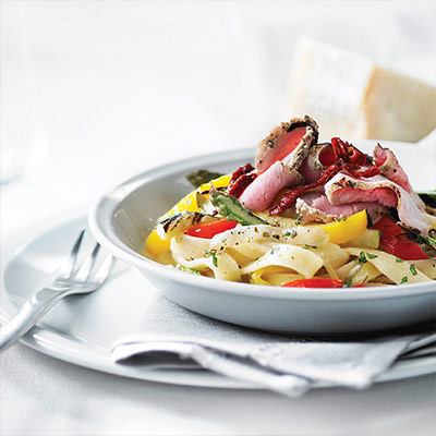 Pork Steak with Fettuccini and Mixed Vegetables