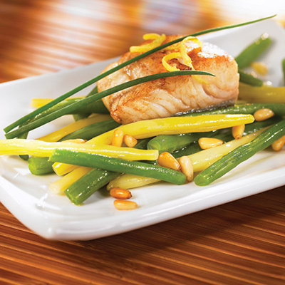 Fish on Garlic Brown Butter Beans with Pine Nuts