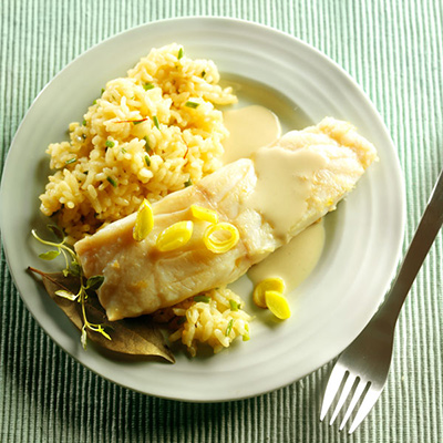 Oven-roasted white fish fillets on risotto