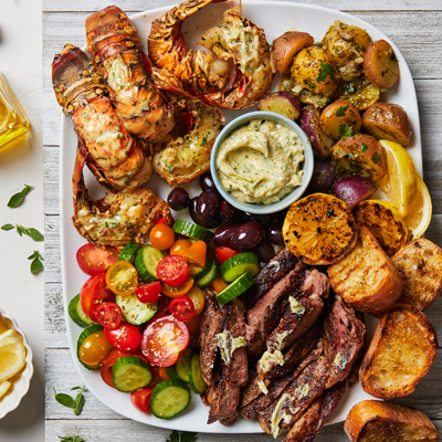 Greek Style Grilled Lobster Tails and Steak Platter