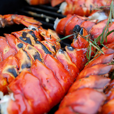 BBQ Lobster with Ginger-infused Oil, Coriander and Tomatoes