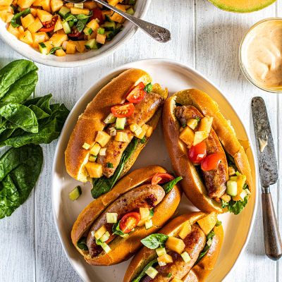 Brioche hot dog with cantaloupe salsa