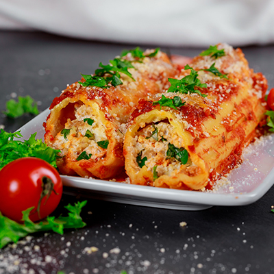 "Three Cheese and Spinach Manicotti ""Al Forno"""