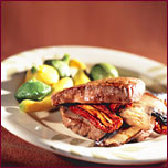 Angus Top Sirloin Beef stuffed with Portabella and Dried Tomatoes