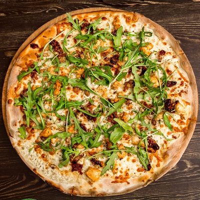 Grilled Chicken, Sun-Dried Tomato and Aragula Pizza