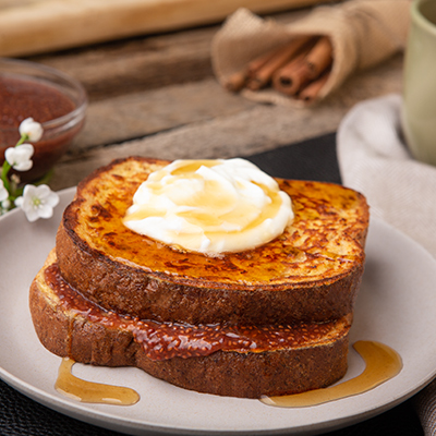 French toast sandwich with strawberry jam, Chantilly and maple caramel