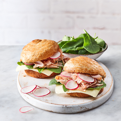 Turkey Breast, Cheese, Spinach and Radish Sandwich on Brioche Croissant